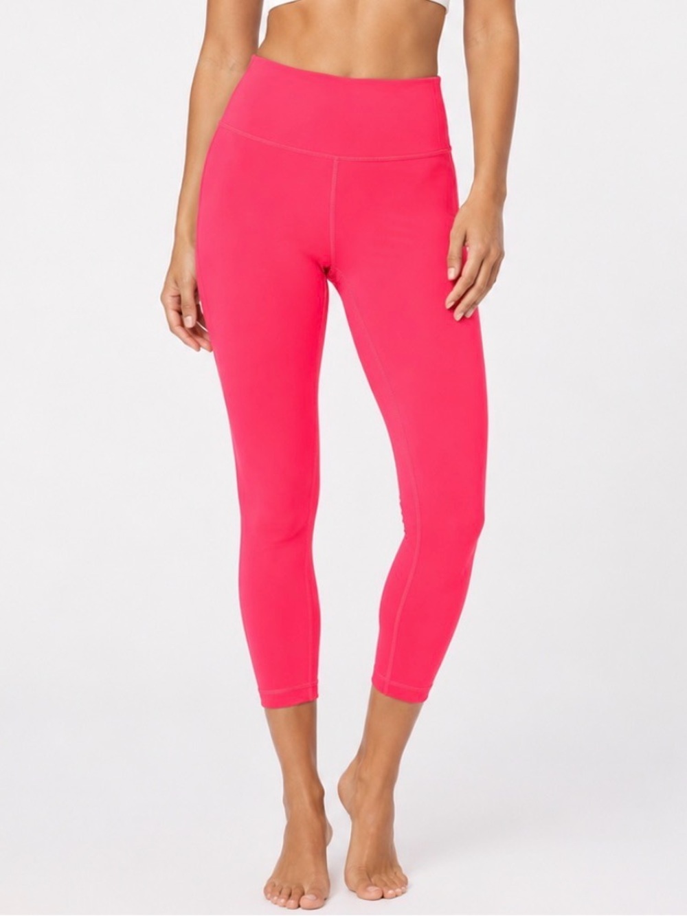 Lululemon high-rise cropped leggings in a vibrant hot pink/neon coral color SZ 6